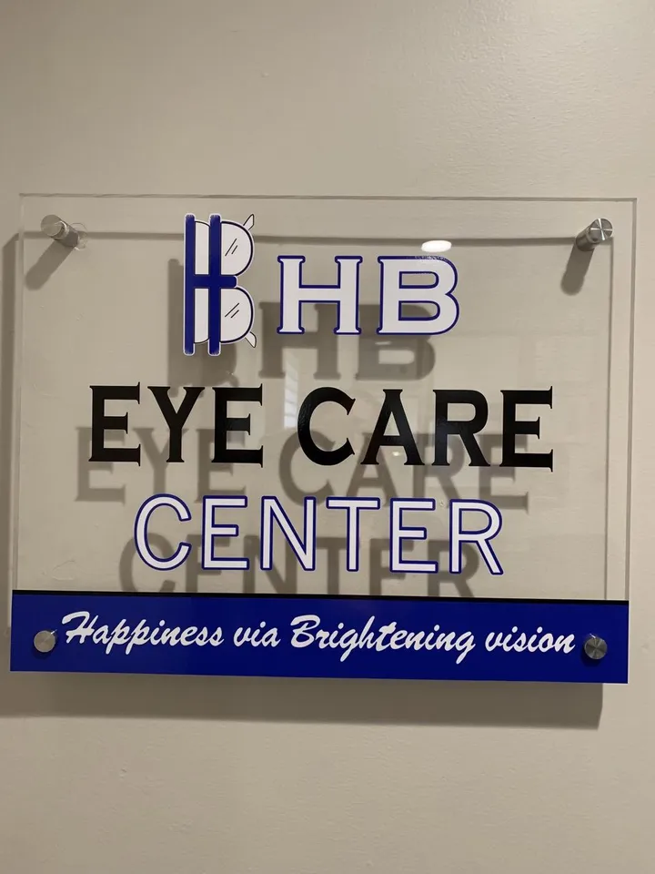 HB Eye Care Center sign: Happiness via Brightening Vision